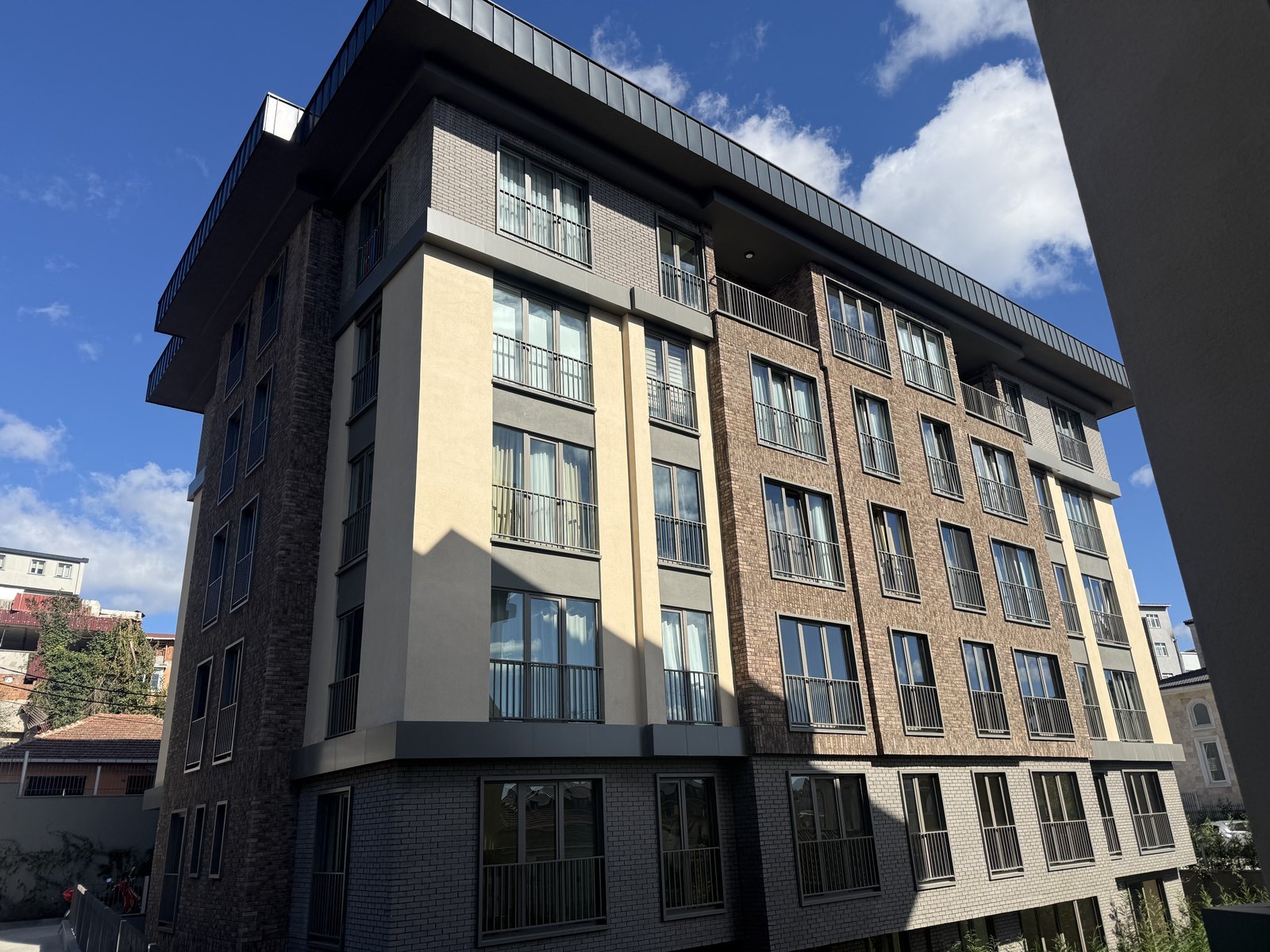 The finished new building. October 2026